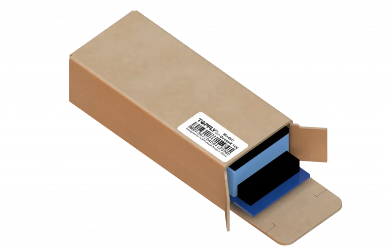 TOPFLYtech DecoyX 100 asset tracker in compact cardboard casing